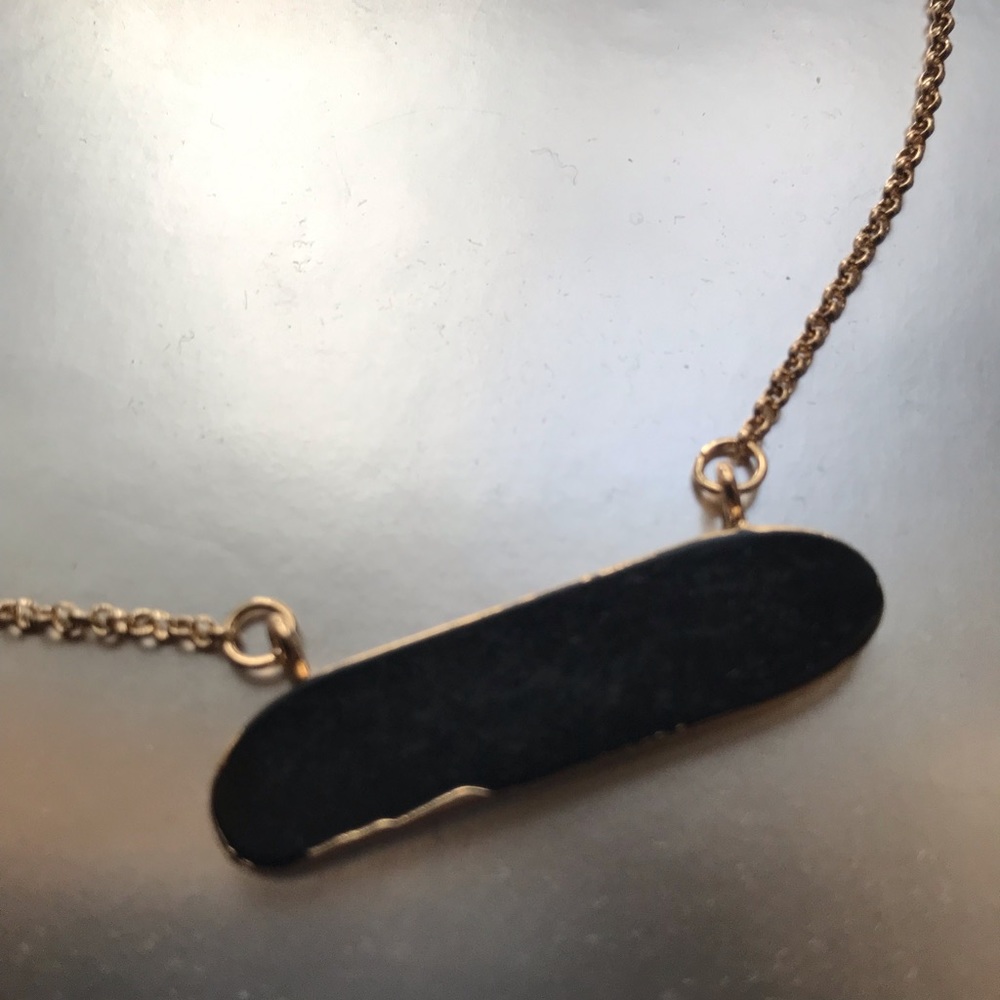 Natural black stone necklace in gold